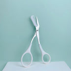 Pink eyebrow trimming scissors with built-in comb - stainless steel, precise grooming tool, creating perfect eyebrows